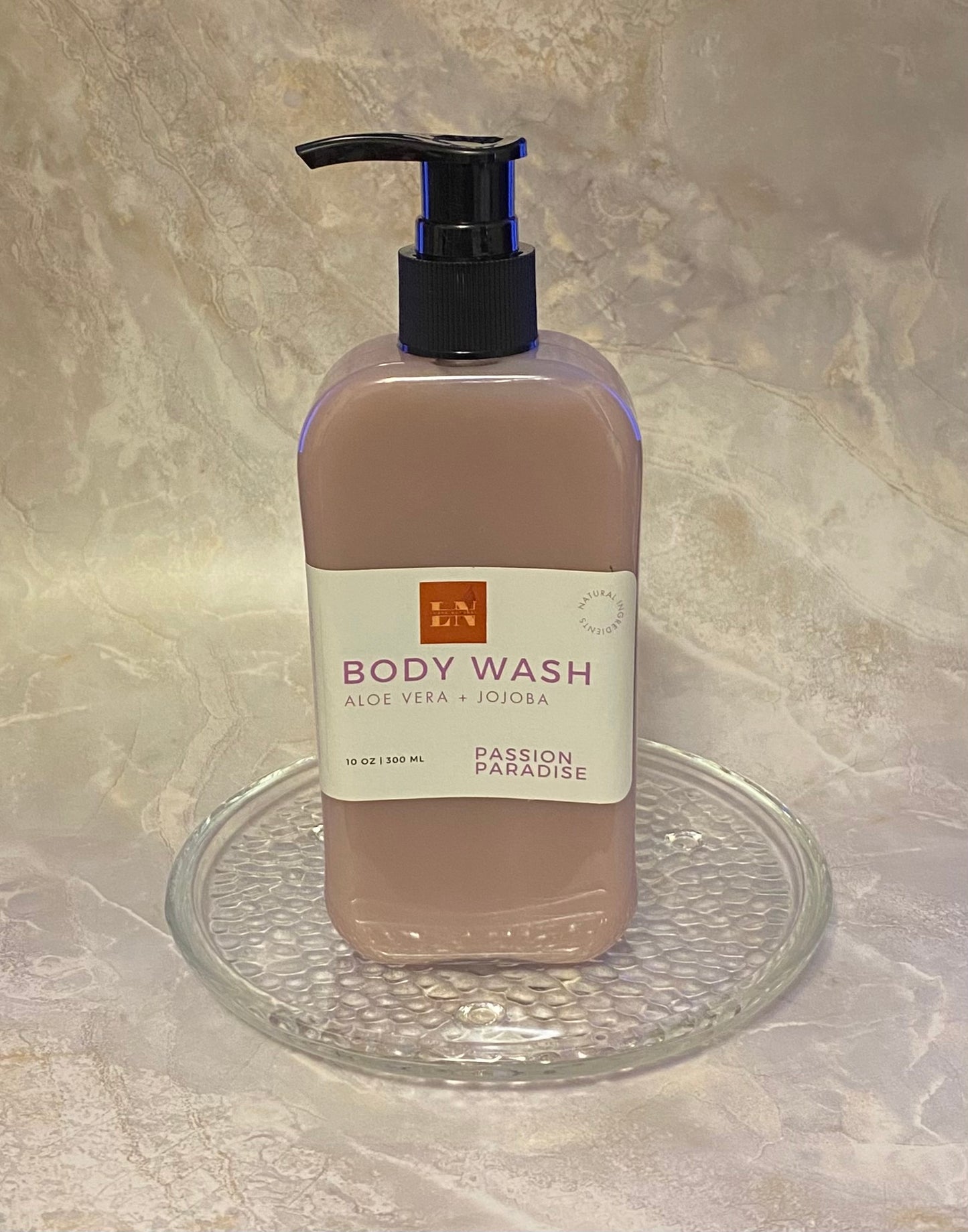 Purple body wash with key ingredients aloe vera and jojoba oil. Smells like paradise.